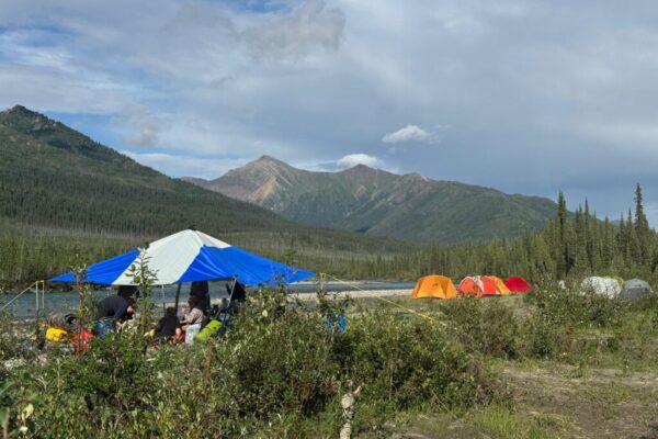 Camp along the river, photo by Ronalda Moses. Camp along the river, photo by Ronalda Moses.